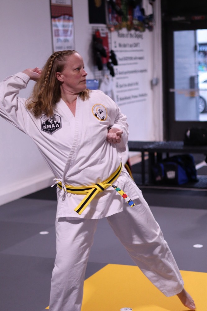 Adult student in a ready stance during class at Crest Martial Arts
